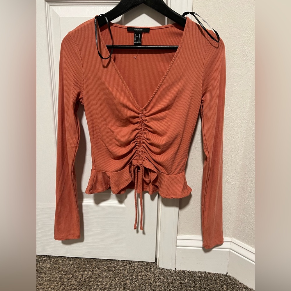 PEACH long sleeve ribbed cinched blouse